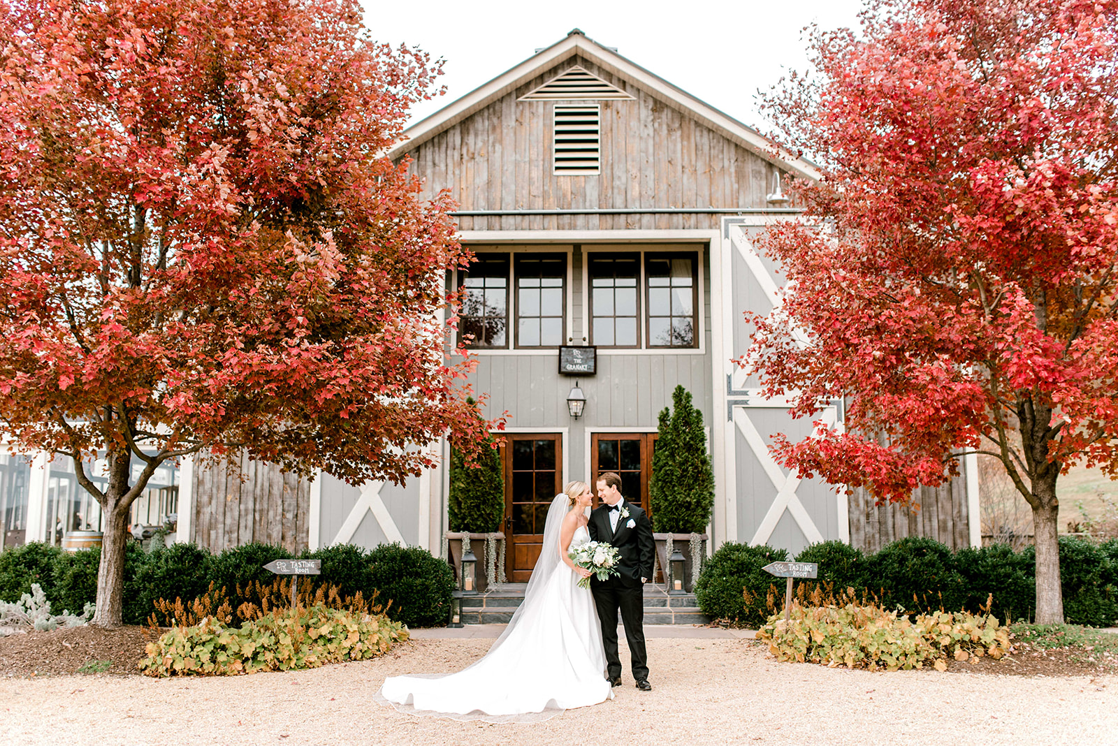 Bride and Groom in front of Pippin Hill Vineyards on a beautiful autumn day